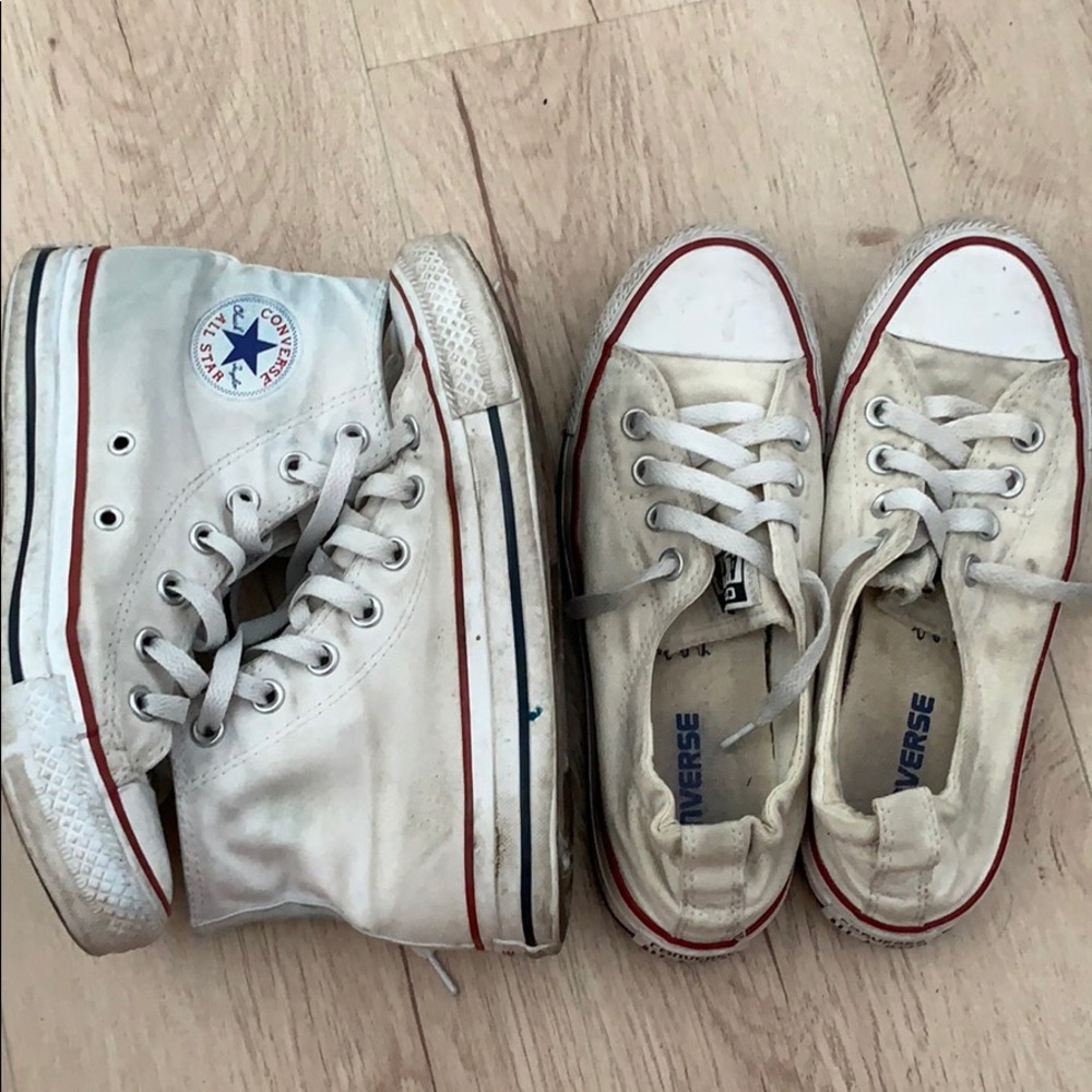 Two pairs of white Converse